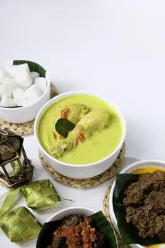 The dishes served during Eid celebrations are rendang, dendeng balado, opor.. Stock Photos