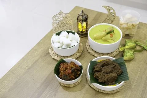 The dishes served during Eid celebrations are rendang, dendeng balado, opor ayam Stock Photos