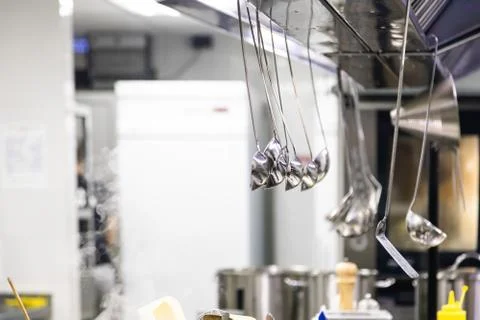 Dishes while cooking in the kitchen in a restaurant. Close-up Stock Photos