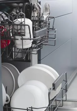 Dishwasher after cleaning process. Stock Photos