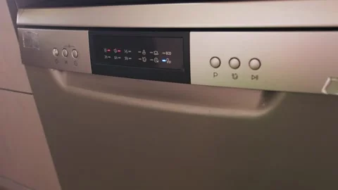 Dishwasher control panel close-up as washing program starts, digital display and 動画素材 333478721