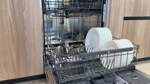 Dishwasher with dishes inside, slow motion Video stock 311560175