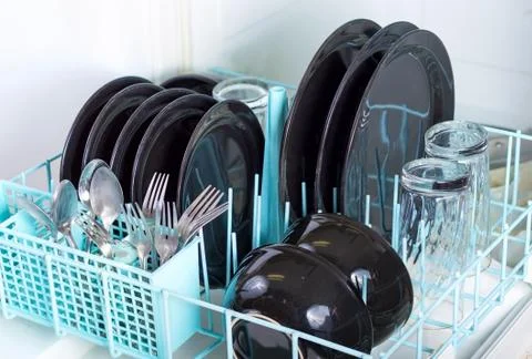 Dishwasher rack. Stock Photos