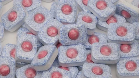 Dishwasher tablet background Video stock 239257430