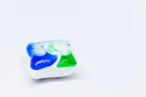 Dishwasher tablet on white background Stock Photos