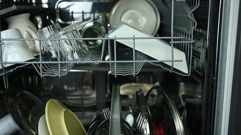 Dishwasher with various washed clean dishes Stock Footage 122097355