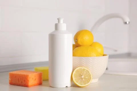 Dishwashing detergent on the background of the kitchen Foto stock