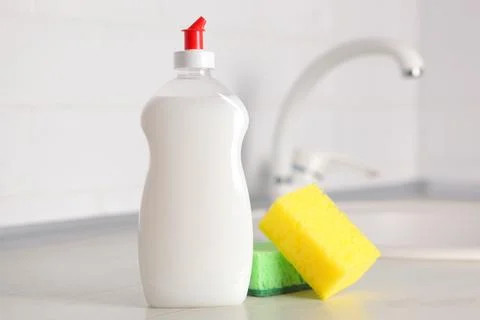 Dishwashing detergent on the background of the kitchen Foto stock