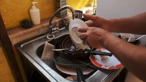 Dishwashing in Kitchen Sink Stock Footage 303414989