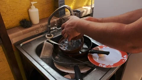 Dishwashing in Kitchen Sink Stock Footage 303415275