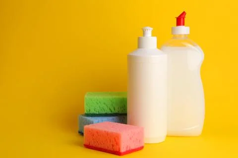 Dishwashing liquid on a colored background Foto stock
