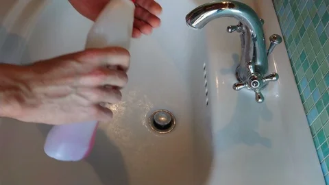 Disinfect your hands to avoid coronavirus infection Stock Footage 127181611