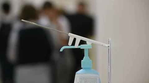 Disinfectant soap dispenser on a wall inside a new hospital Video stock 250170037