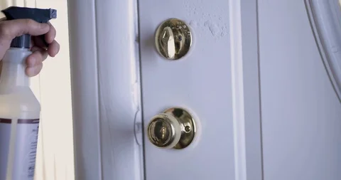Disinfecting Door Handles Stock Footage 126950833