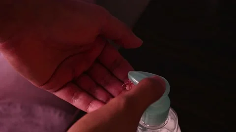 Disinfecting hands using sanitizer. Stock Footage 135018344