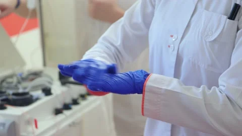 Disinfection of gloved hands Stock Footage 235466854