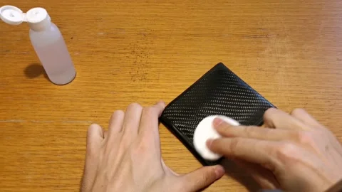 Disinfection wallet to avoid the spread of coronavirus Stock Footage 130396766