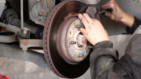 Disk brake pad and car disk brake system change service Stock-Footage 256241067
