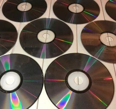 Disk dispersion refraction reflection of light colors texture on white backgr Foto stock