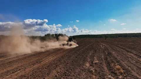 Disk harrow on plowing field. Soil cultivation field use tractor. Stock Footage 211889801