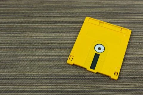 Diskette for disk system vintage technology image top view. Illustrazione stock