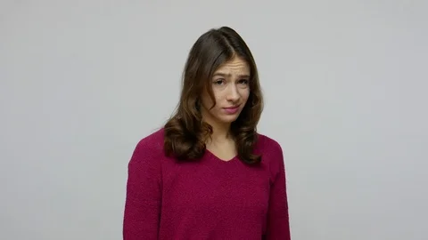 Dislike, bad service! Grumpy dissatisfied brunette woman in pullover showing Stock Footage 124291949