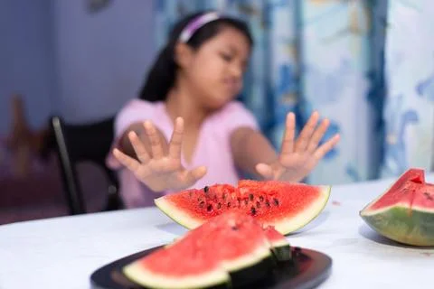 Disliking water melon Stock Photos