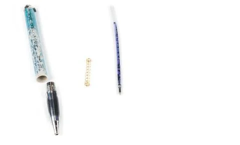 Dismantled empty old pen. Write out pen on the white Stock Photos