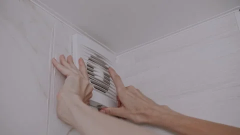 Dismantling Air Vent Front Plate for Household Extractor Cleaning Stockbeeldmateriaal 341398217