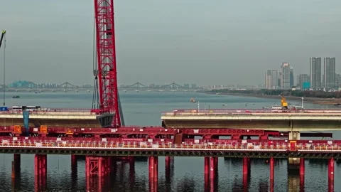 Dismantling of a bridge in Hangzhou, China using cranes and barges. Stock Footage 325718286