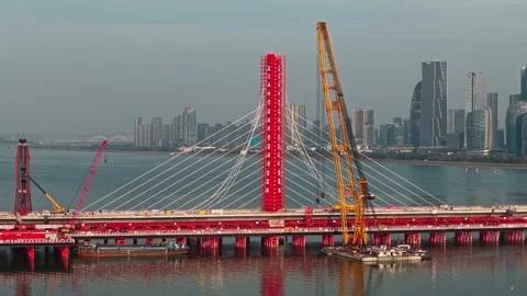Dismantling of a bridge in Hangzhou, China using cranes and barges Stock Footage 335643880