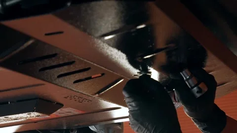 Dismantling of crankcase protection systems by an auto repair shop employee. Stock Footage 248167215