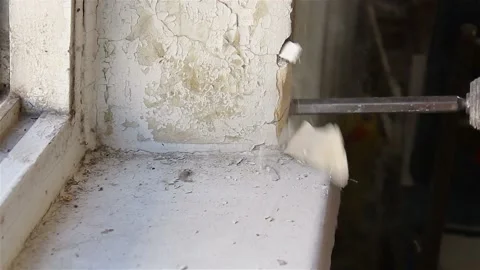 Dismantling the old window. Working with a perforator. Stock-Footage 86364436