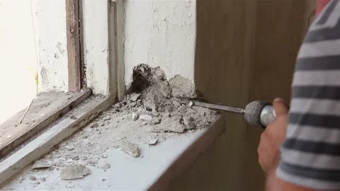 Dismantling the old window. Working with a perforator. Stock Footage 87644399