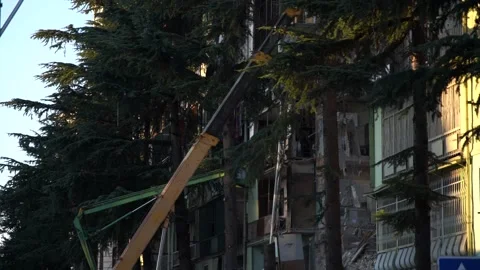 Dismantling the rubble of a collapsed house Stock Footage 164359776