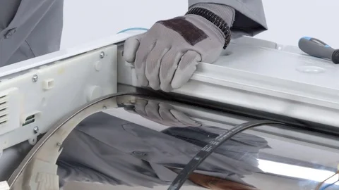 Dismantling a washing machine Stock Footage
