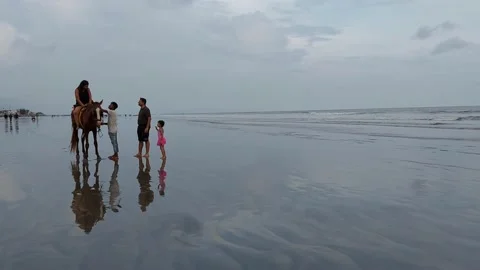 Dismounting problem at Mandarmani beach Stock Footage 219223078