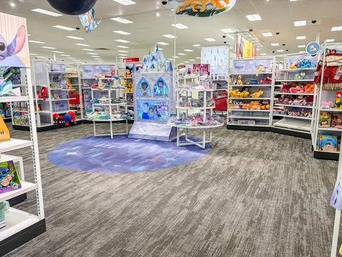 Disney toy display section inside a retail store with plush toys, dolls, an.. Foto stock