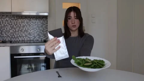 Disordered eating mindset around food choices Video stock 334577581
