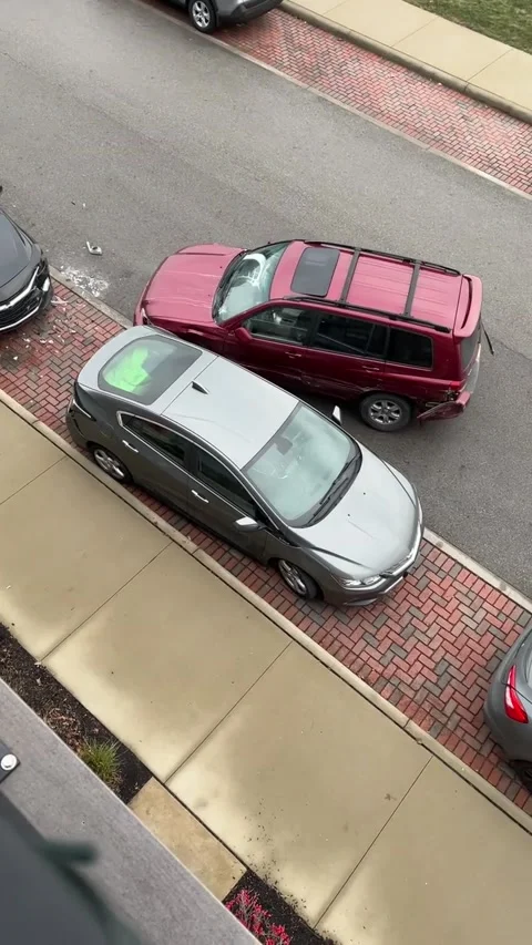 Disoriented Driver Crashes Into Multiple Parked Vehicles, Columbus, Ohio, USA -  Video stock 298965543