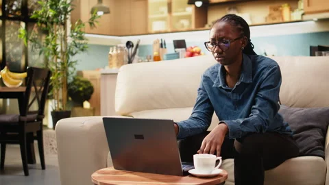 Disoriented woman being preoccupied with task apprehension at home Stock-Footage 344241681