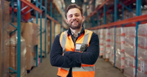 Dispatch, face and worker in warehouse with arms crossed, smile and distribution Stock Footage 318641393