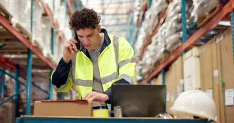 Dispatch, phone call and worker in warehouse with laptop, conversation and Stock Footage 319107827
