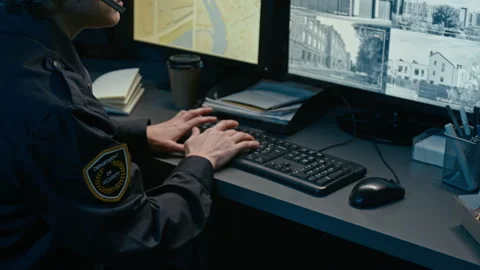 Dispatchers Hands Typing and Using Computer at Police Station Stock Footage 330606722