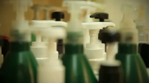 Dispensers on bottles Stock Footage 39968419