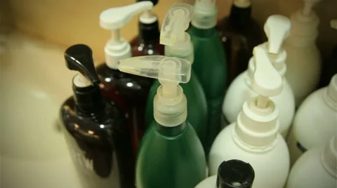 Dispensers on bottles Stock Footage 41085910