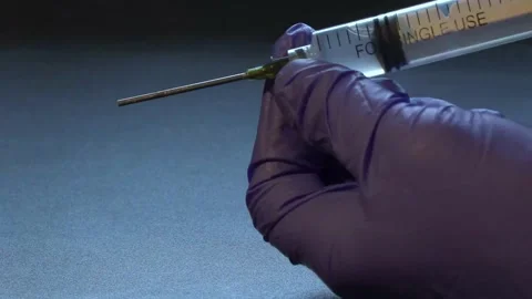 Dispensing Syringe Close Up Video stock 153435811