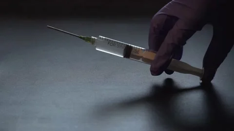 Dispensing a Syringe Video stock 153435806