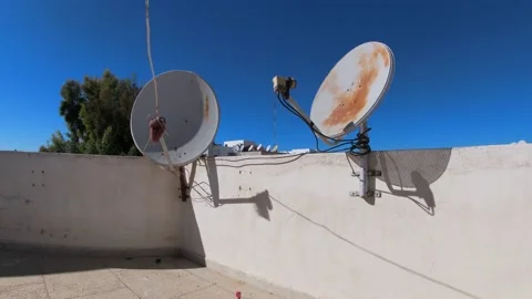 Display of 2 satellite TV on a Moroccan rooftop 動画素材 165233603