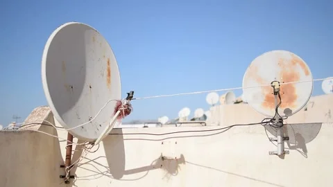 Display of 2 satellite TV on a Moroccan rooftop 動画素材 165397836